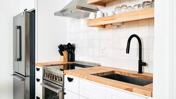 Fridge, stovetop, cookware/dishes/utensils