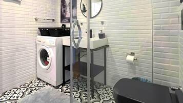 Hair dryer, towels, soap, shampoo