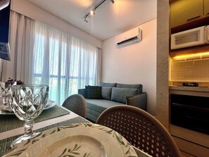 Apartment | Living area | 32-inch Smart TV with cable channels - Green Porto 201 (Ipojuca)