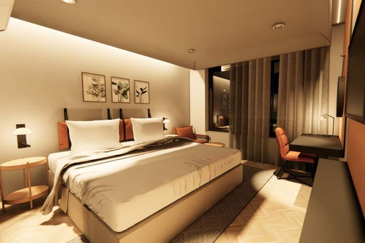 Executive kamer | Lakens van Egyptisch katoen, luxe beddengoed, een minibar