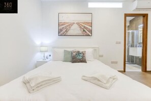 1 bedroom, desk, iron/ironing board, travel cot