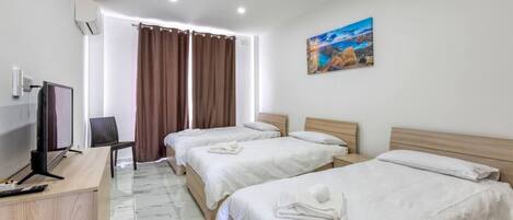 Desk, iron/ironing board, travel crib, WiFi