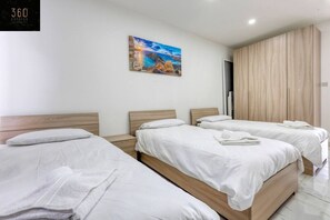 1 bedroom, desk, iron/ironing board, travel cot