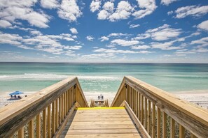 A wooden boardwalk leading to a beach with clear turquoise water and a clear sky. - Adagio D-201 - Beautiful Poolside, Corner Unit!! (Santa Rosa Beach)