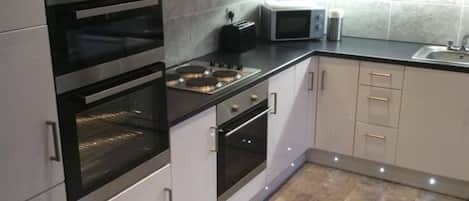 Apartment | Private kitchen | Fridge, microwave, oven, stovetop