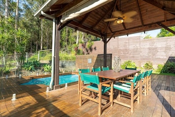 Crystal-clear waters and a sun-drenched deck - the perfect poolside escape.