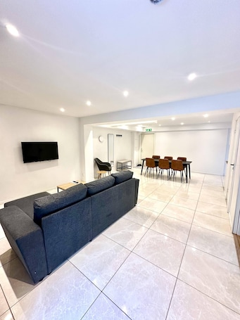 Family Suite | Living area | 32-inch Smart TV with digital channels