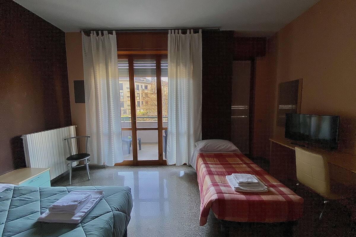 Quadruple Room | Down comforters, laptop workspace, iron/ironing board (on request)