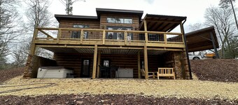 Luxury cabin in county but not far from downtown. Hot tub on back porch. 