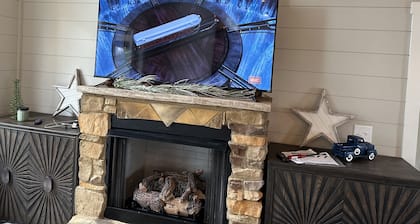 Luxury cabin in county but not far from downtown. Hot tub on back porch.