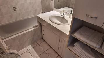 Hair dryer, towels, soap, shampoo