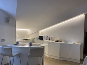 Fridge, microwave, oven, coffee/tea maker