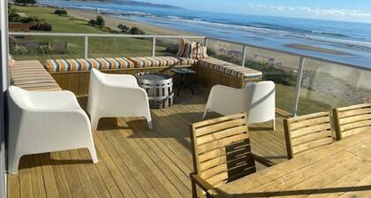 Ultimate Beachfront - Family Friendly with games room and multiple decks