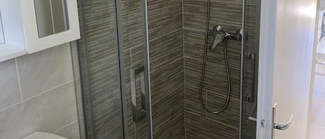 Hair dryer, towels, soap, shampoo