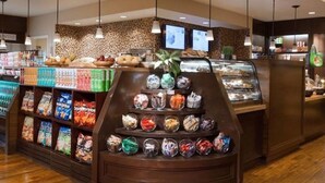 A bakery counter with various baked goods and a display of assorted pastries. - Ocean Front Westin Villas North!  Gorgeous Pools, Beach & Amenities! (Lahaina)