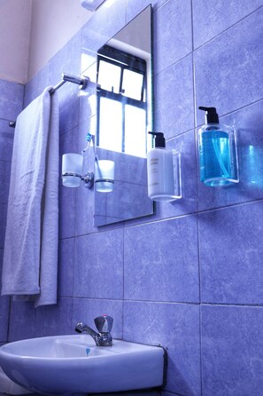 Shower, towels, soap, shampoo