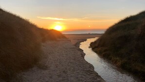 A beach path with a small stream, leading to the ocean. - "Tuukka" - 350m from the sea by Interhome (Løkken)