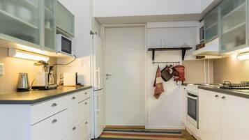 Fridge, microwave, cookware/dishes/utensils