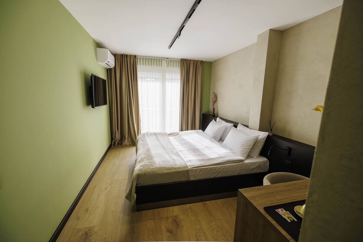 Deluxe Double Room | Memory foam beds, minibar, in-room safe, desk