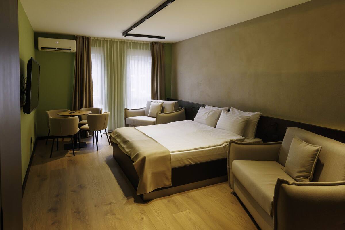 Family Quadruple Room | Memory foam beds, minibar, in-room safe, desk