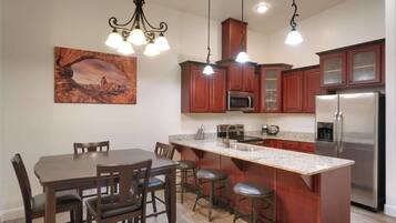 Coffee/tea maker, fridge, microwave, oven