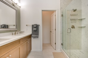 Shower, hair dryer, towels, soap