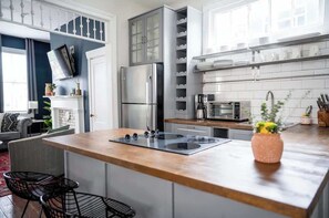 Fridge, microwave, coffee/tea maker, toaster