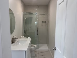 Hair dryer, towels, soap, shampoo