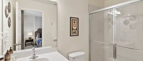 Shower, hair dryer, towels, soap