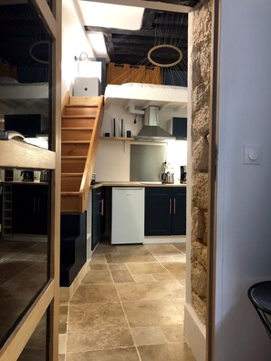 Fridge, microwave, stovetop, coffee/tea maker