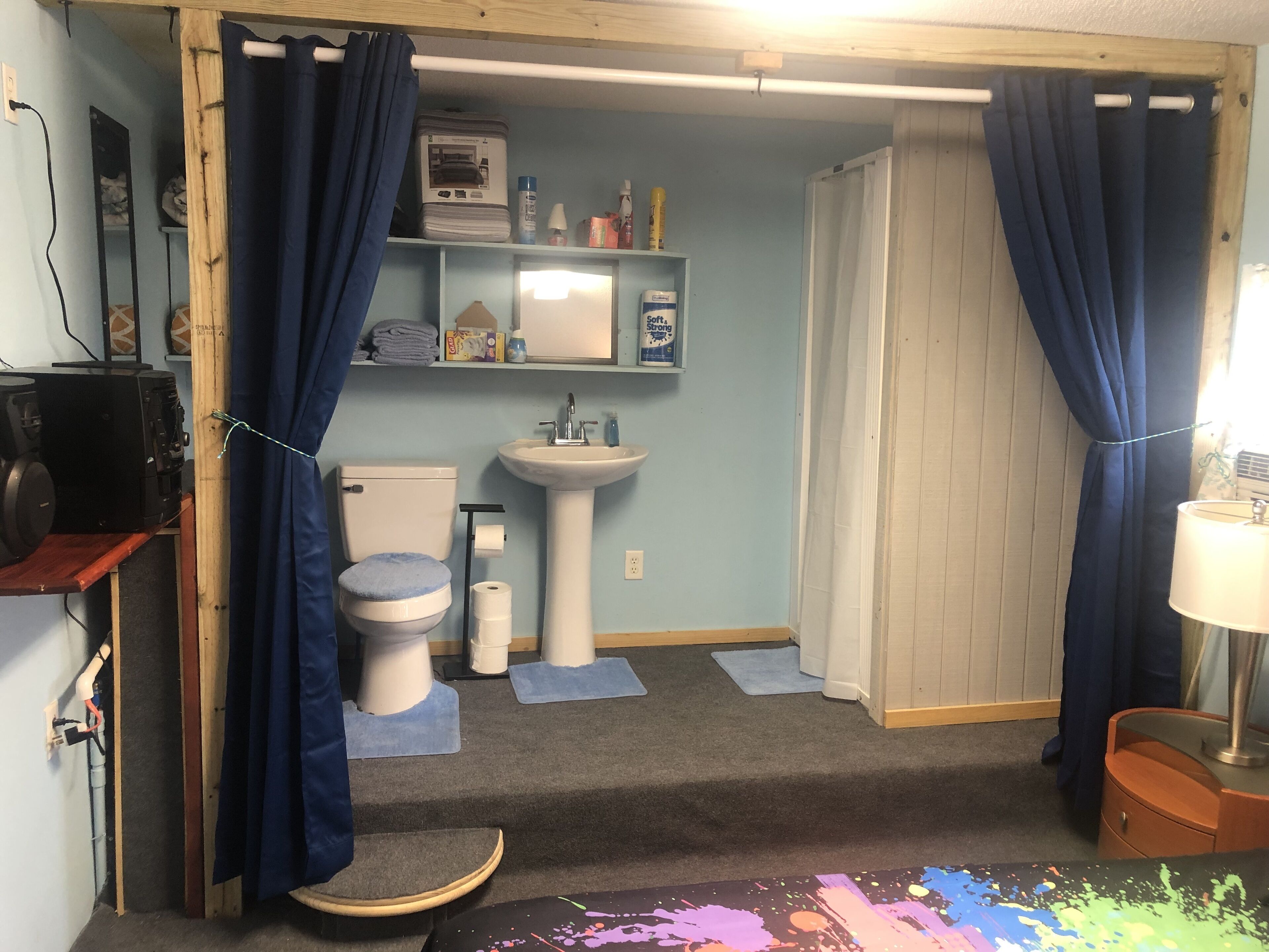 Shower, towels, toilet paper