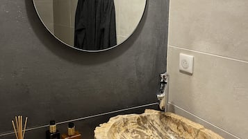 Shower, towels, soap, toilet paper