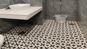 Classic Room | Bathroom | Slippers - PK BOUTIQUE HOTEL (Noida)