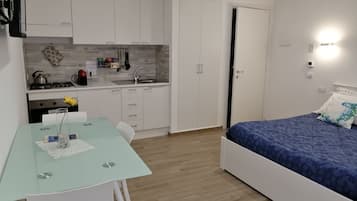 Apartamento estándar | Cocina privada | Hervidor eléctrico y trona infantil