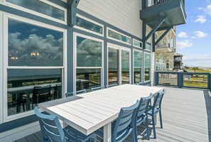 Outdoor dining - Idyll Tides: Stunning 6 BR - Pet Friendly, Priv. Pool, Beachfront, Sleeps 24! (Indian Pass)