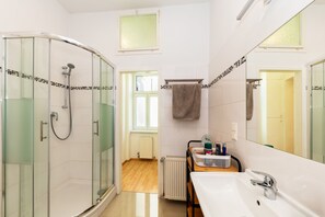 Shower, hair dryer, towels, soap