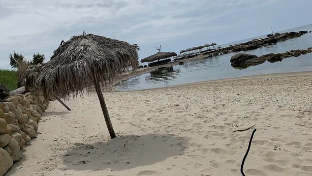 Private beach nearby, white sand