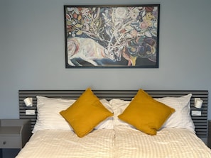 Desk, laptop workspace, free WiFi, bed sheets