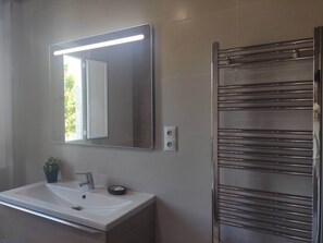 Hair dryer, bidet, towels, soap