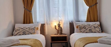 2 chambres, fer et planche Ă repasser, Wi-Fi gratuit, draps fournis