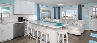 Short stroll to the beach! Newly renovated, 3 bedroom condo, wrap around porch