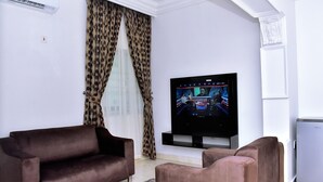 Deluxe Apartment | Living area - Viola Apartments & Suites (Abuja)