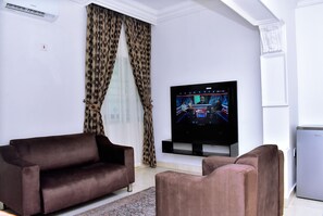 Deluxe Apartment | Living area - Viola Apartments & Suites (Abuja)