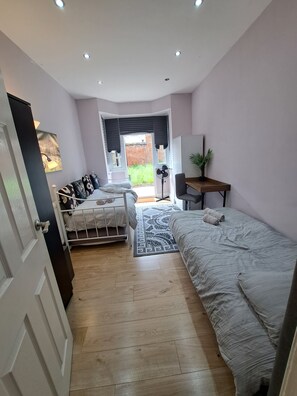Desk, laptop workspace, free WiFi, bed sheets