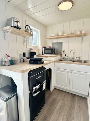 Microwave, coffee/tea maker, toaster, high chair