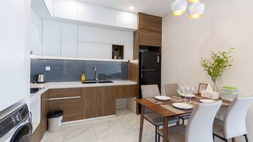 Four Bedrooms Apartment | Private kitchen | Fridge, microwave, electric kettle, cookware/dishes/utensils