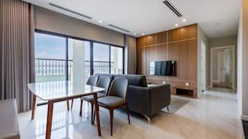 Two Bedrooms Apartment | Living area | 45-inch LCD TV with cable channels