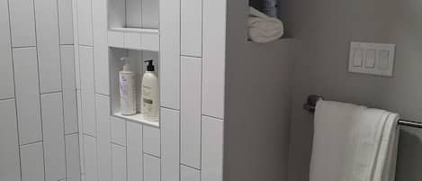 Hair dryer, towels, soap, shampoo