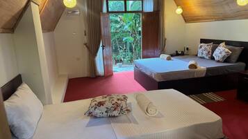 Luxury Triple Room, Garden View | In-room safe, desk, free WiFi