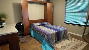 2 bedrooms, desk, iron/ironing board, travel crib